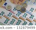 Close up of euros banknote and coins. 132879499