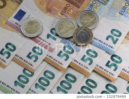 Close up of euros banknote and coins. Close up of euros banknote and coins. 132879499