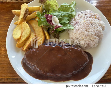 Hamburger steak, rice, potatoes and salad Hamburger steak, rice, potatoes and salad 132879612