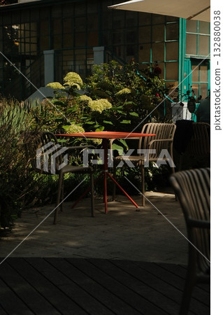 Prague Garden Cafe Table in Summer Light Prague Garden Cafe Table in Summer Light 132880038