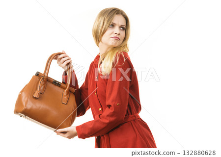 Woman protecting her handbag 132880628