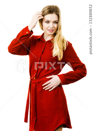 Female wearing casual red dress 132880652