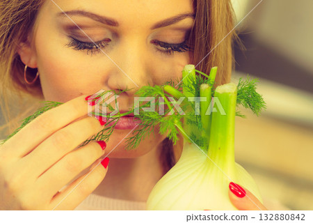 Woman holding fennel bulb 132880842