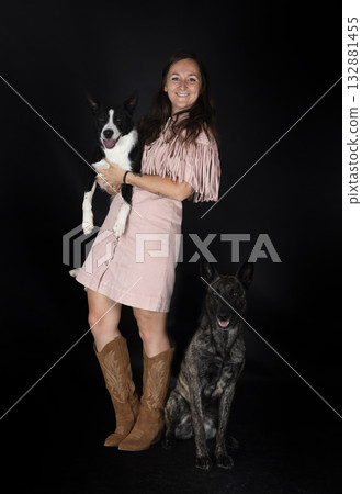 Dutch Shepherd, border collie and woman in studio 132881455
