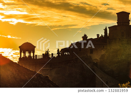 Sunset over Varlaam monastery in Meteora, Greece Sunset over Varlaam monastery in Meteora, Greece 132881959