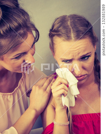 Friend comforting sad woman Friend comforting sad woman 132881989