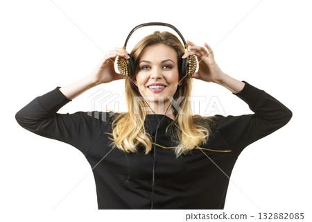 Teenage woman wearing headphones 132882085