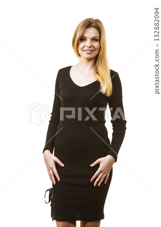 Woman wearing black dress Woman wearing black dress 132882094