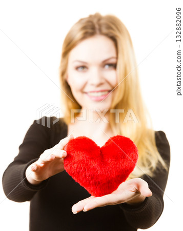Woman holding red heart Woman holding red heart 132882096