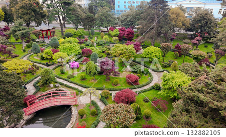Drone view on JAPANESE GARDEN  IN Batumi  wiith red leaves of Japanese maple (in May!) 132882105