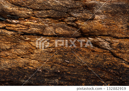 Natural rock strata forming rough textured stone background 132882919