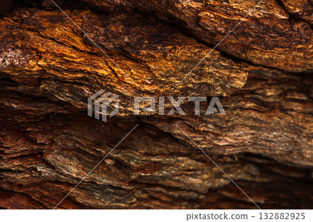 Abstract close view of cracked layered rock surface Abstract close view of cracked layered rock surface 132882925
