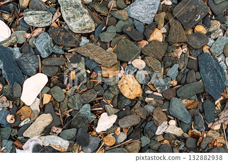 Close-up of rough multicolored pebbles and stones texture Close-up of rough multicolored pebbles and stones texture 132882938