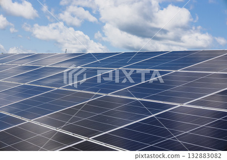 Shiny Solar Panels Under Bright Sky at Utility Scale Solar Farm for Clean Energy 132883082