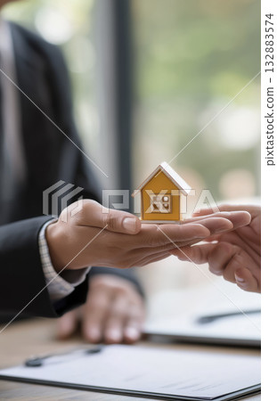 Real estate agent house model hand deal contract mortgage sale customer property key agreement office business housing finance 132883574