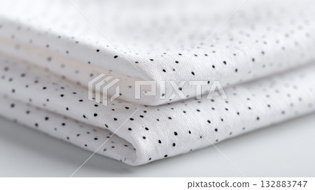 Minimalist close-up of classic polka dot cotton textile, clean high-resolution photography ideal for fabric mockups and product presentations Minimalist close-up of classic polka dot cotton textile, clean high-resolution photography ideal for fabric mockups and product presentations 132883747