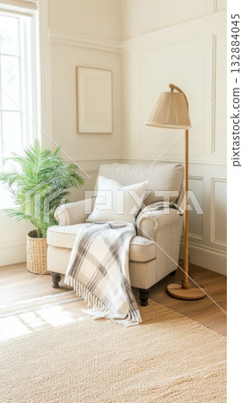 Cozy Reading Nook with Armchair, Leaf Motif Lamp and Neutral Beige Decor for Rest and Relaxation 132884045