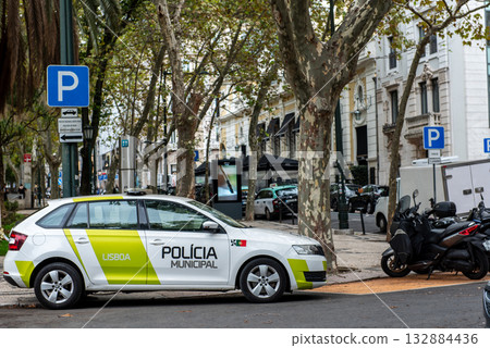 Municipal police car parked on Lisbon city street Municipal police car parked on Lisbon city street 132884436