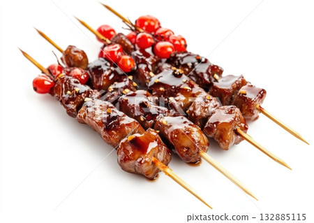 Tanghulu Skewers with Candied Hawthorn Berries Isolated on White Background for Minimalist Food Photography Tanghulu Skewers with Candied Hawthorn Berries Isolated on White Background for Minimalist Food Photography 132885115