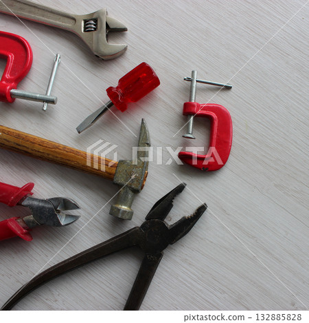 A well used mechanic tools in order on wood plank copy space stock image A well used mechanic tools in order on wood plank copy space stock image 132885828