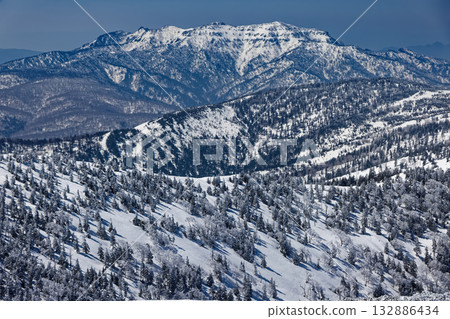 Mount Hotaka in Joshu with snow remaining, seen from Mount Koshibutsu 132886434