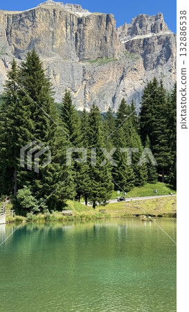Scenic Mountain Landscape With Lake and Pine Forest in Dolomites, Italy 132886538