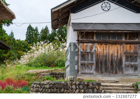 Storehouse and silver grass 132887277