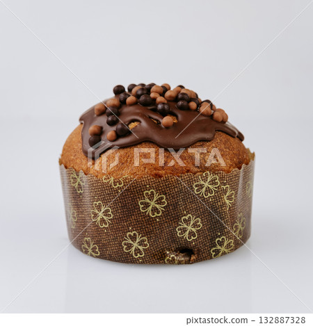 Mini Christmas panettone with chocolate topping, isolated festive dessert on white Mini Christmas panettone with chocolate topping, isolated festive dessert on white 132887328