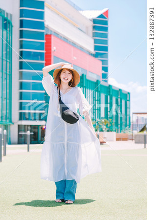 Smiling woman participating in an event Smiling woman participating in an event 132887391