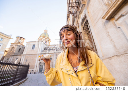 Happy Tourist with Sicilian Cannolo Happy Tourist with Sicilian Cannolo 132888348