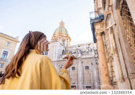 Happy Tourist with Sicilian Cannolo Happy Tourist with Sicilian Cannolo 132888354