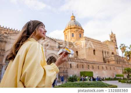 Woman Holding Cannolo near Palermo Cathedral Woman Holding Cannolo near Palermo Cathedral 132888360