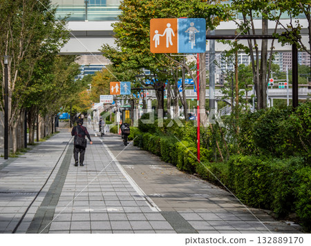 Sidewalks where bicycles are allowed and pictograms showing them Sidewalks where bicycles are allowed and pictograms showing them 132889170