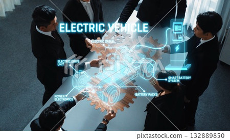 Team of professionals collaborating on electric vehicle technology, showcasing innovative design and smart battery systems in a modern setting. Raster 132889850