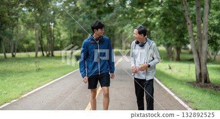 Father and Son Walking Together, Promoting Wellness and Connection 132892525