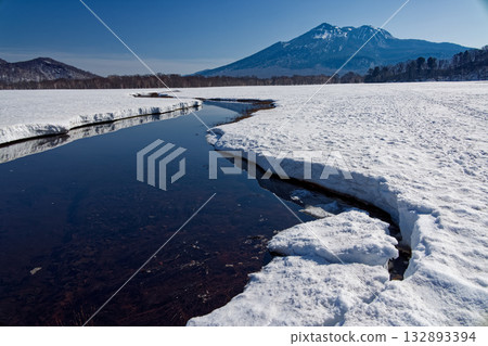 Morning view of Mt. Hiuchigatake from the melting snow of Ozegahara Morning view of Mt. Hiuchigatake from the melting snow of Ozegahara 132893394