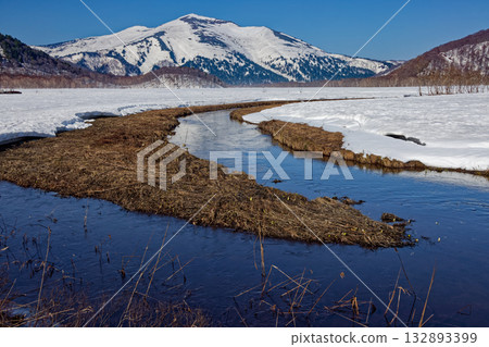 Melting snow in Ozegahara, Shimonohori River and Mt. Shibutsu 132893399