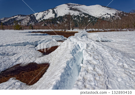 Mount Shibutsu seen from Ozegahara and Yamanohana in the snowy season 132893410