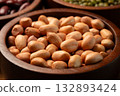 Raw Peanut in wooden bowl. Close-up 132893424