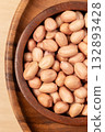Raw Peanut in wooden bowl. Top view 132893428