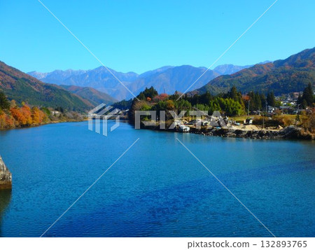 View of Yomi Dam Lake and the Central Alps from the entrance to Atera Valley in autumn 132893765