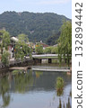 The townscape of Kinosaki Onsen and the Otani River, a tributary of the Maruyama River that flows through the center of the hot spring town, and the Taiko Bridge 132894442