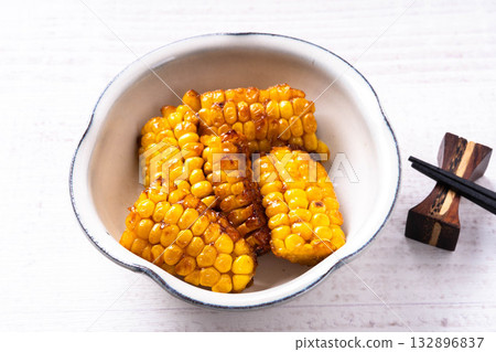 Grilled corn with butter and soy sauce 132896837