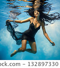 girl in a black dress under water 132897330