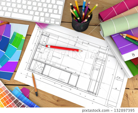 A business scene with blueprints and colorful color charts spread out on an office desk 132897395