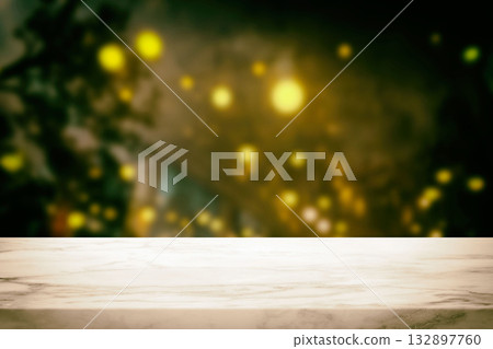 Empty white marble table with a blurred magical firefly forest background. Empty white marble table with a blurred magical firefly forest background. 132897760