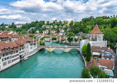 Bern, Switzerland A Picturesque View of the Aare River and Historic Cityscape, Europe 132898352