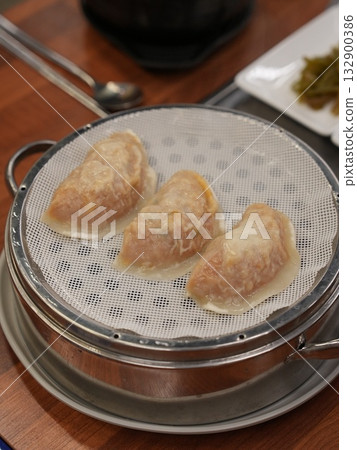 Korean style food. Steamed dumplings Korean style food. Steamed dumplings 132900386