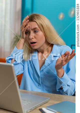 Frustrated woman having software problems with laptop angry girl nervous seeing error mistake virus Frustrated woman having software problems with laptop angry girl nervous seeing error mistake virus 132901884