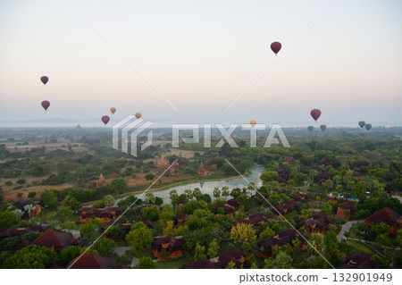 Myanmar, Bagan, view from Bagan Viewing Tower, pagodas in the morning mist, hot air balloon Myanmar, Bagan, view from Bagan Viewing Tower, pagodas in the morning mist, hot air balloon 132901949